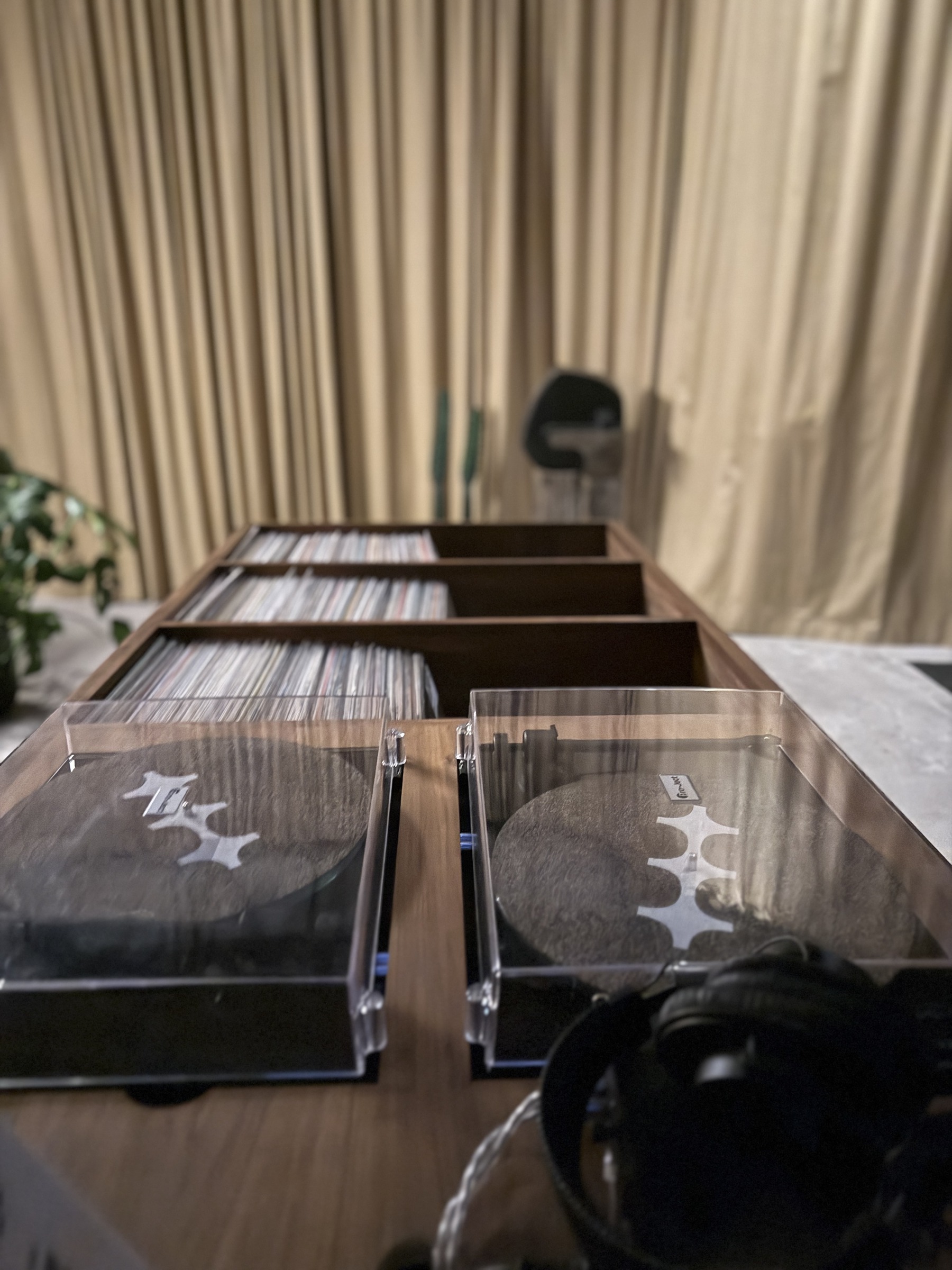 Record bins beside the turntables