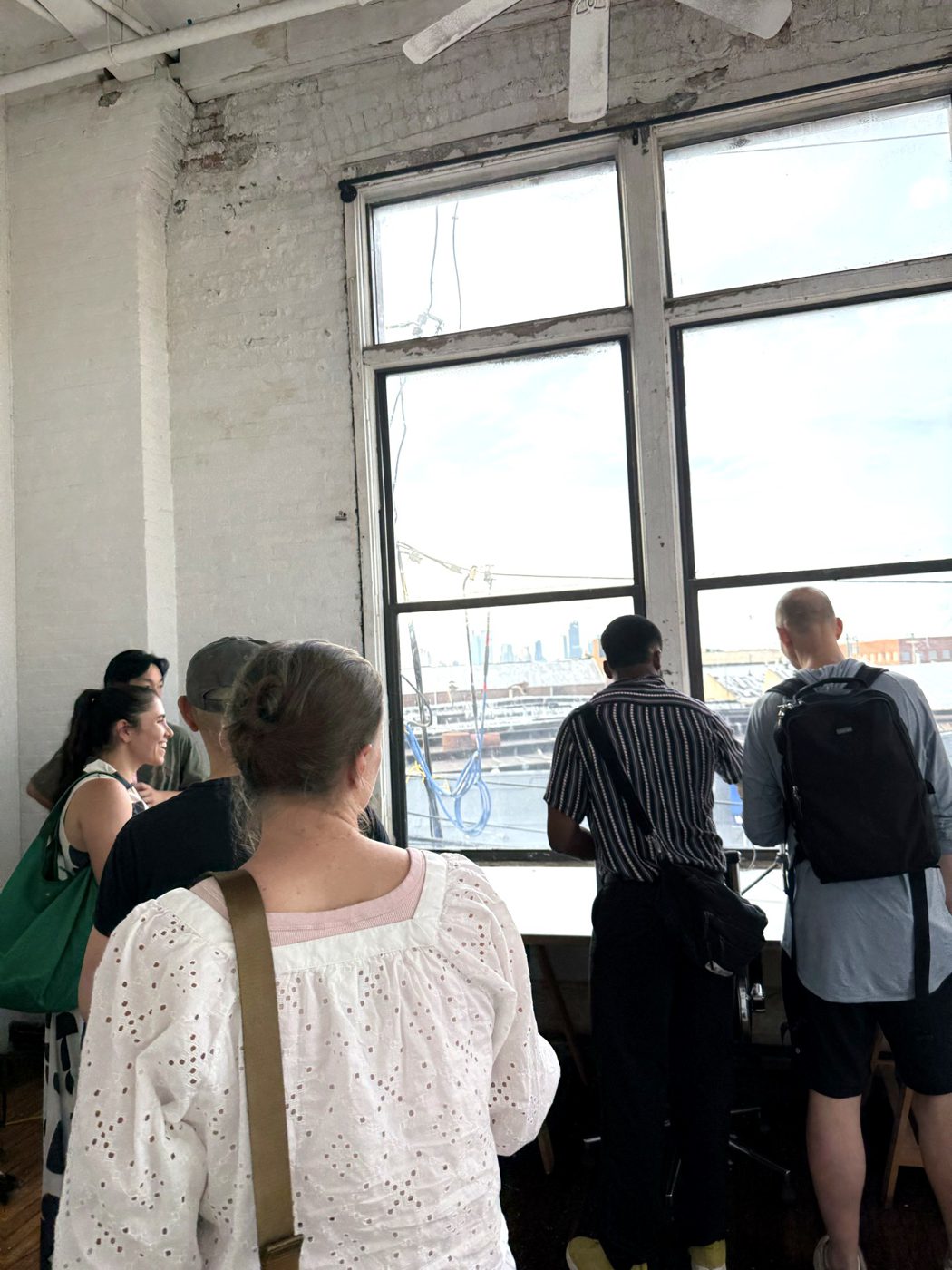Visitors photographing Sean Wang's studio