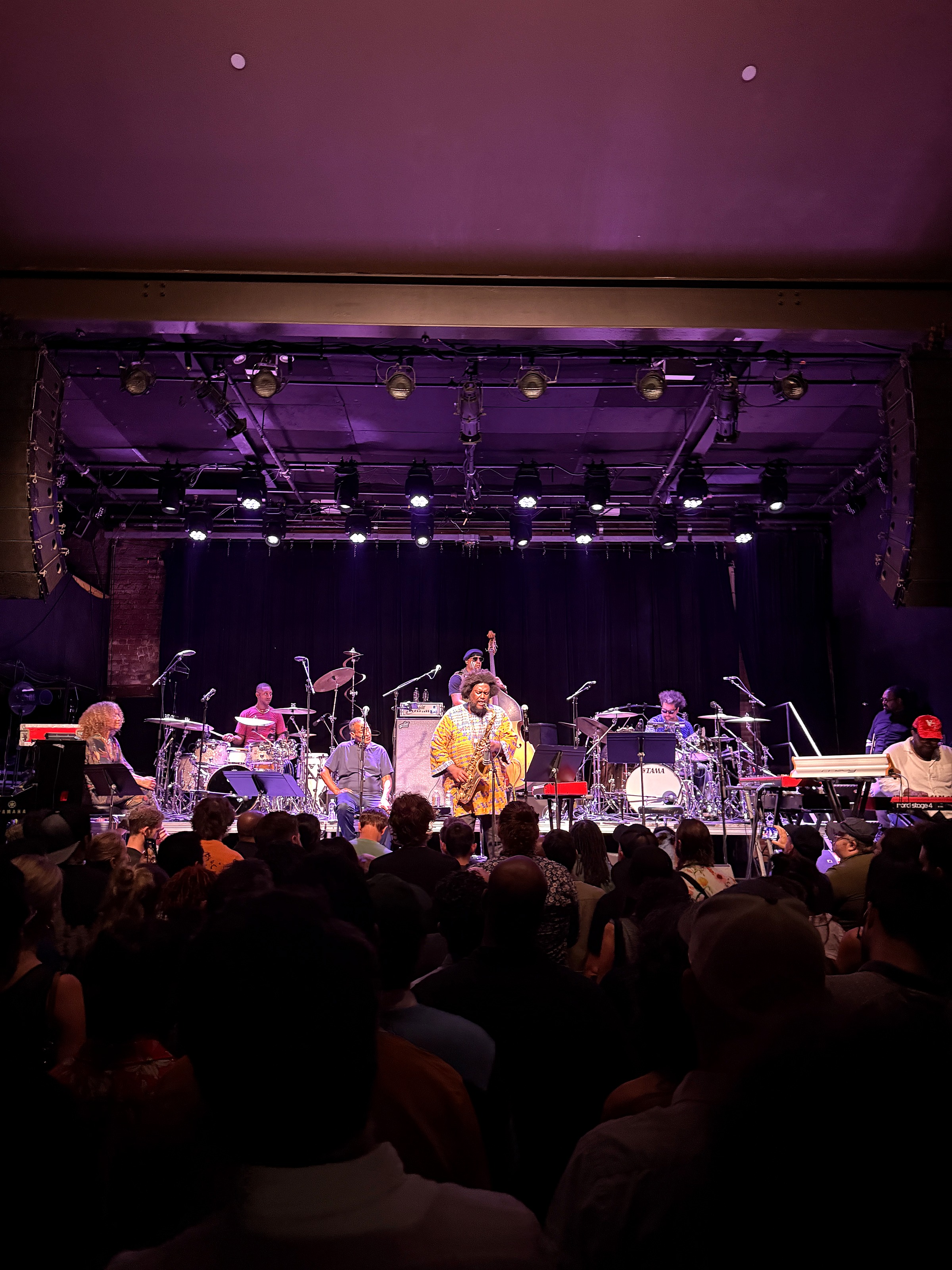 The full band on stage