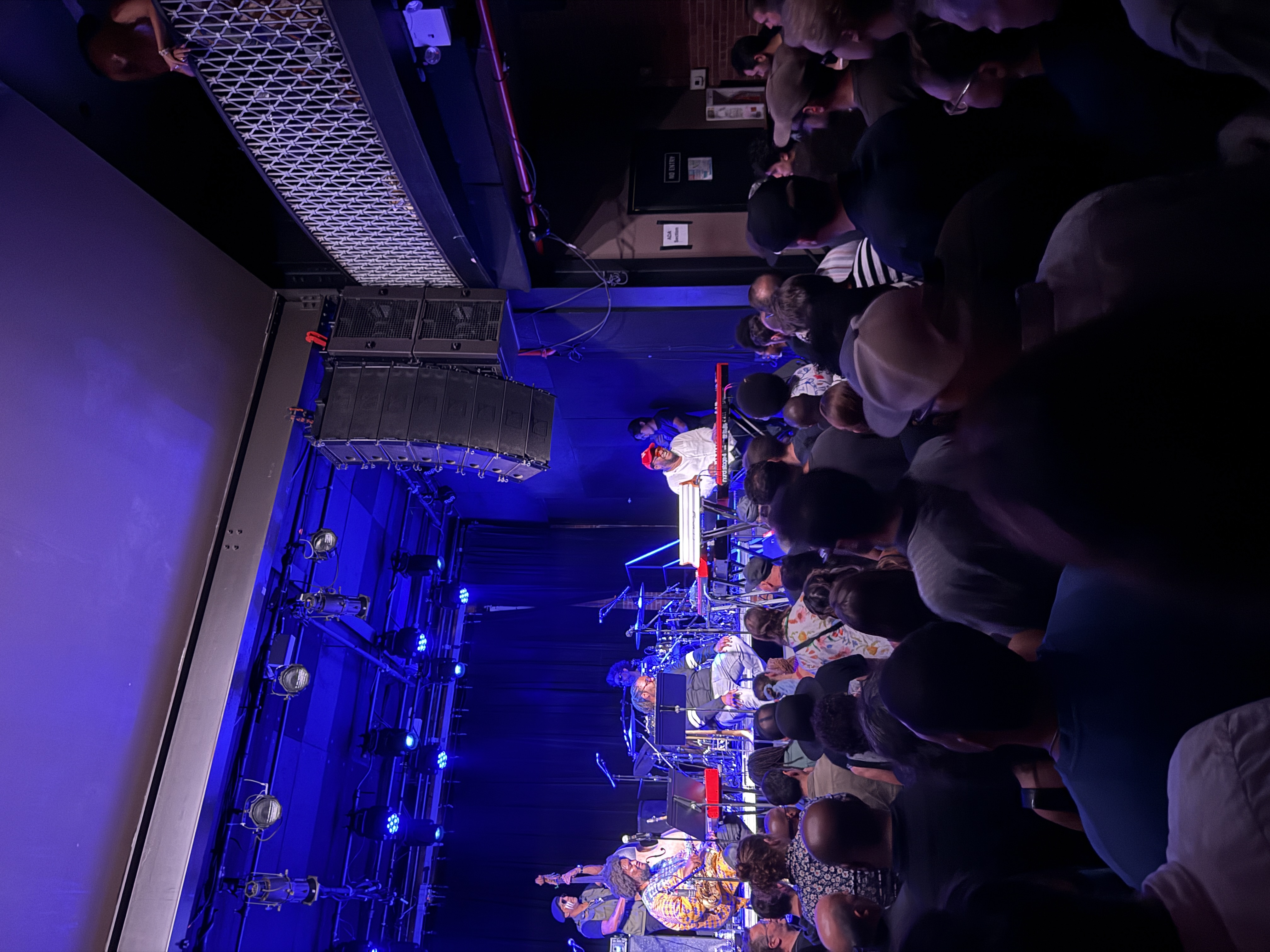 Kamasi Washington stepping to the front of the stage