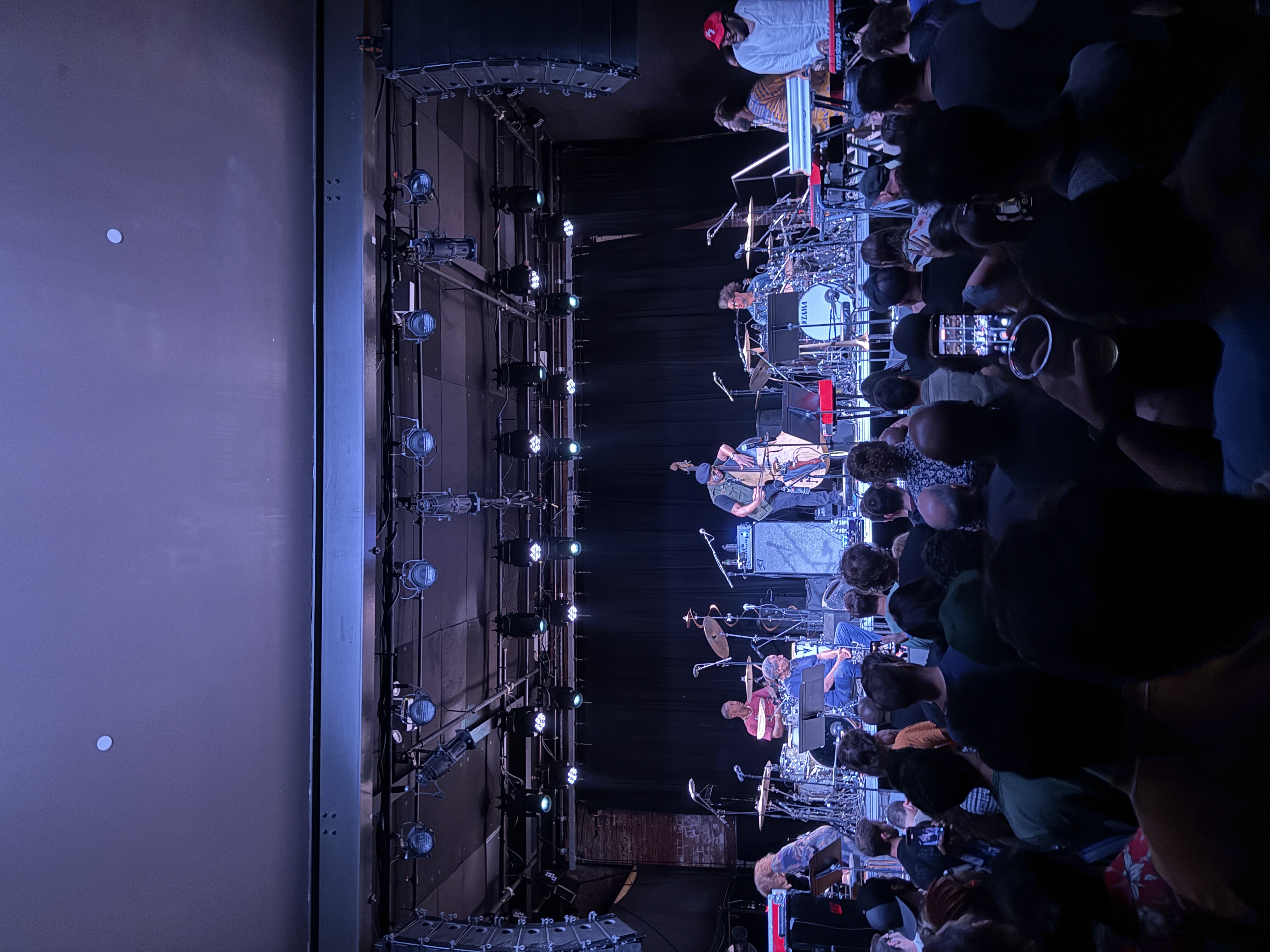 The full stage from the side, two drum kits visible